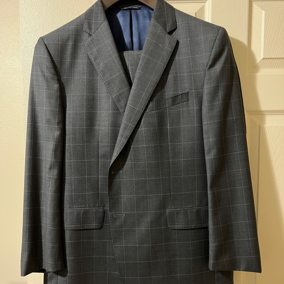 Jack Victor mens suit. Charcoal with blue windowpane detailing.